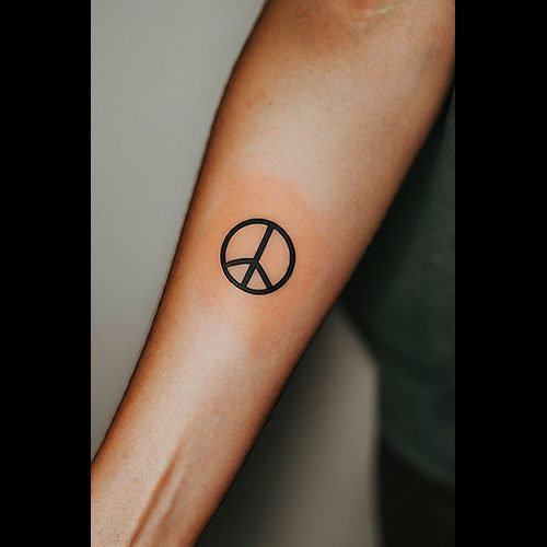 Heart shaped peace symbol tattoo - Tattoogrid.net